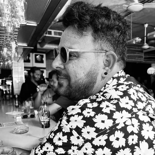 Dehan, stylist at Orange Eleven, black-and-white portrait