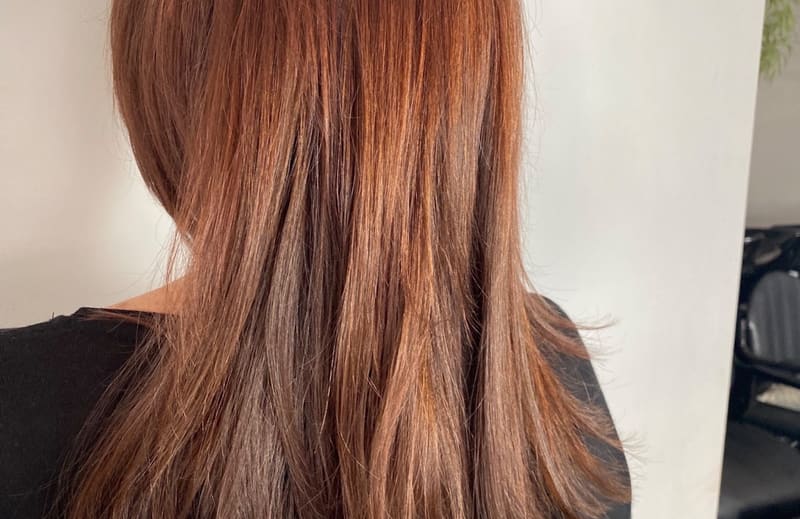 Warm-toned colour on long hair, Orange Eleven client