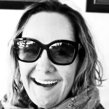 Natasha, co-owner of Orange Eleven, black-and-white portrait